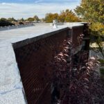 Full flat roof, chimney, and gutter residential restoration project