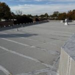 Full flat roof, chimney, and gutter residential restoration project