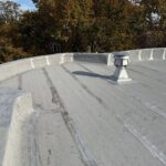 Full flat roof, chimney, and gutter residential restoration project