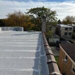 Full flat roof, chimney, and gutter residential restoration project