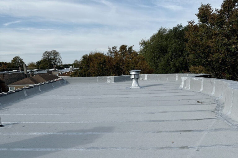 Full flat roof, chimney, and gutter residential restoration project