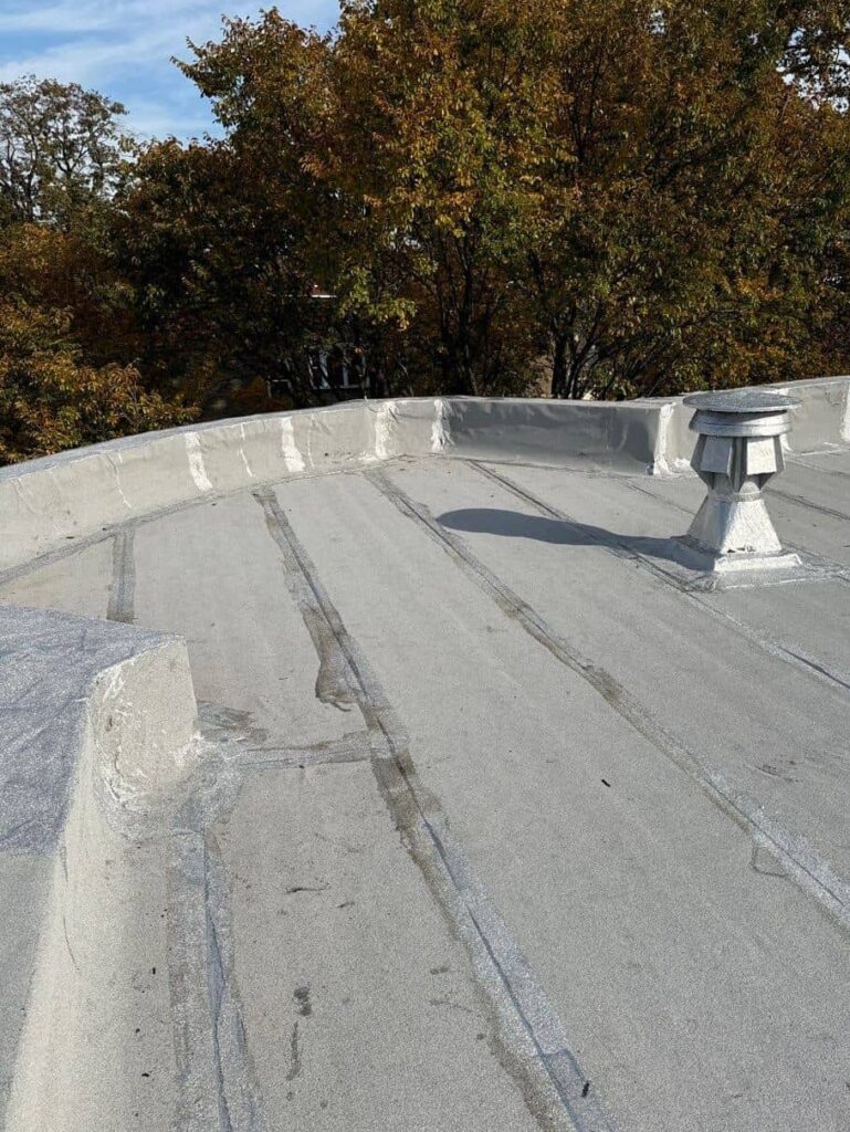 Full flat roof, chimney, and gutter residential restoration project