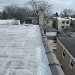 Full flat roof, chimney, and gutter residential restoration project