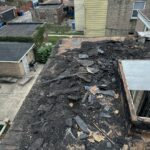 Full flat roof, chimney, and gutter residential restoration project