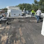 Full flat roof, chimney, and gutter residential restoration project