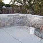 Full flat roof, chimney, and gutter residential restoration project